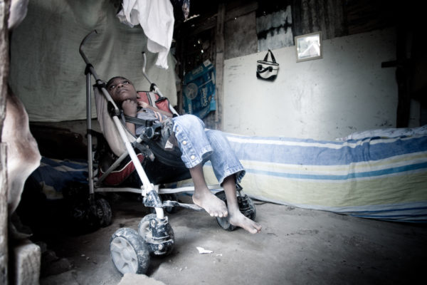 A disabled boy in a camp in Port au Prince, Haiti