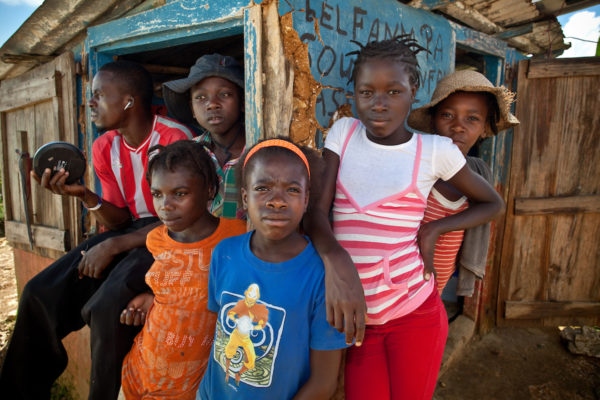 Kids hang out at a market near Caye Michel in the Massif de la Hotte, Haiti