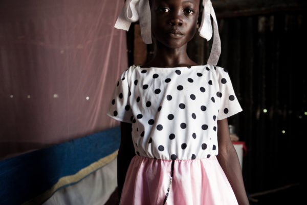 An old face on a young girl in a tent city in Port-au-Prince.